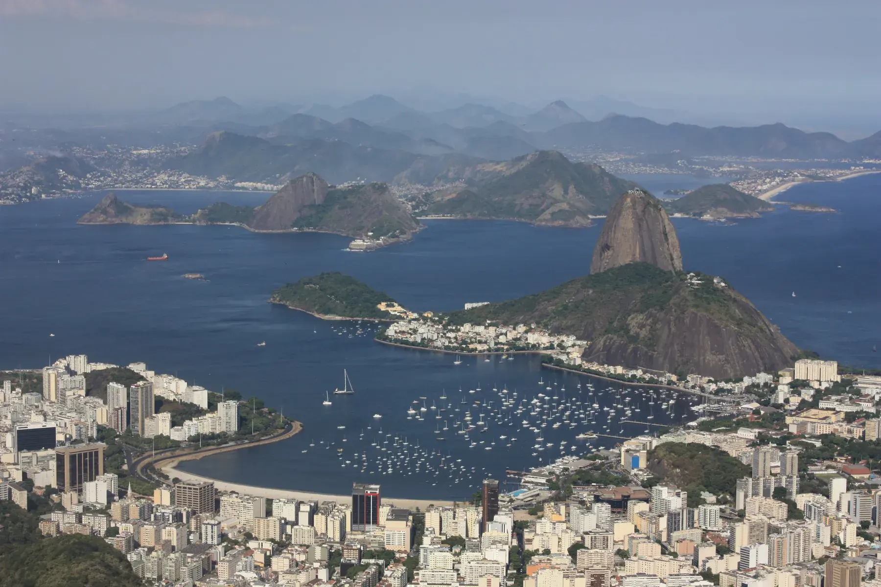 View from Corcovado toward Sugarloaf Mountain, Botafogo Bay, and Guanabara Bay